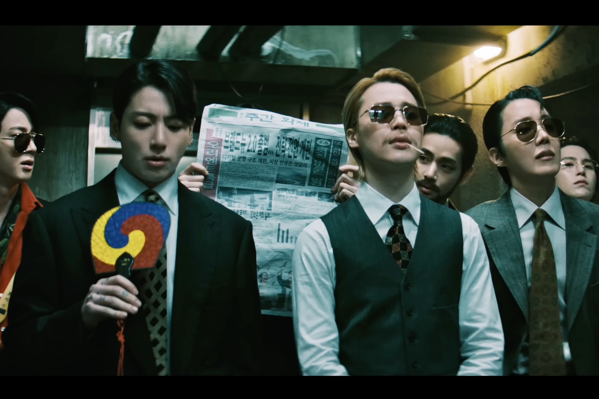 Watch: BTS Makes Hilarious Transformations In “Oldboy”-Inspired MV For “2.0”