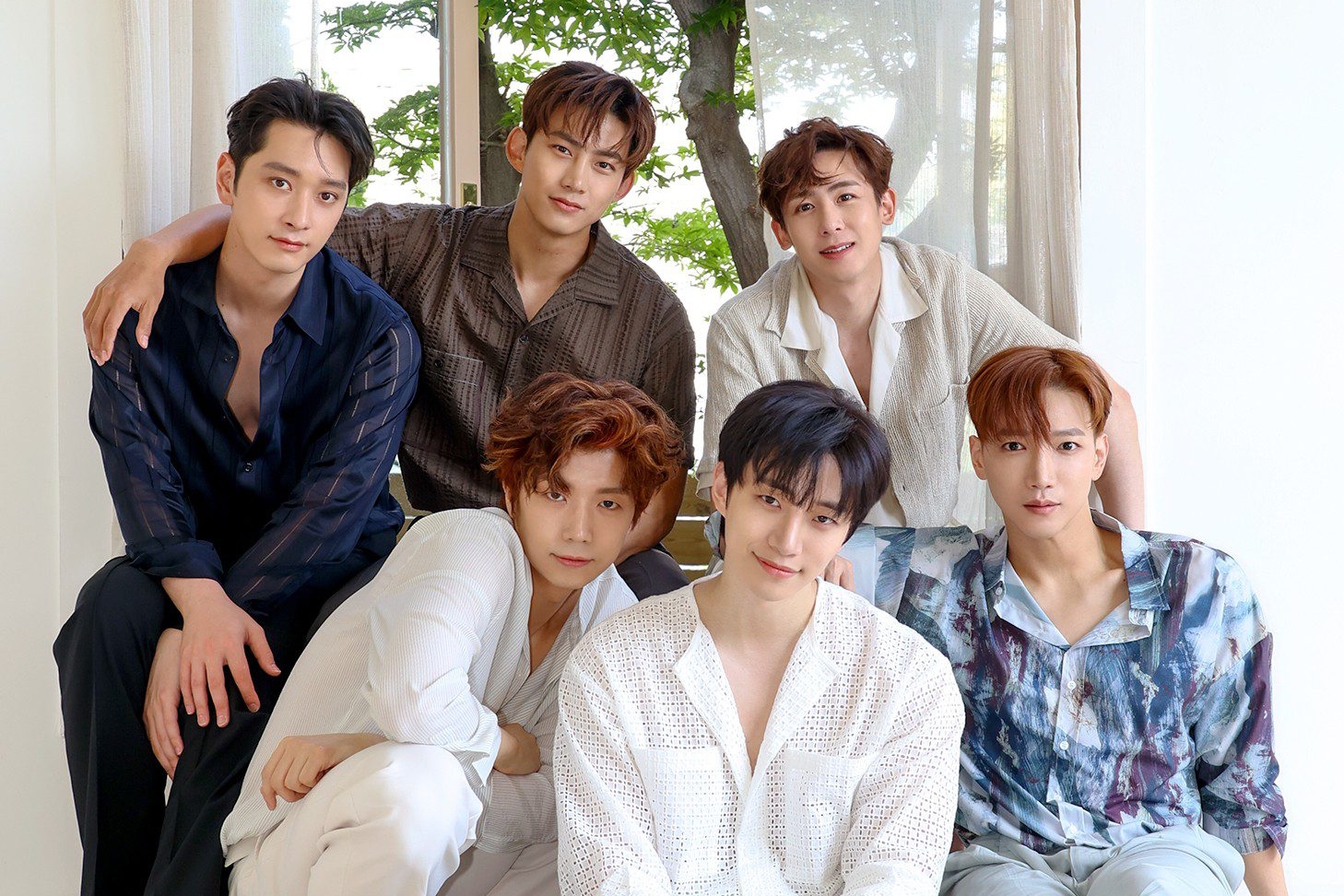 2PM Unveils Third Version of Official Light Stick with New Design